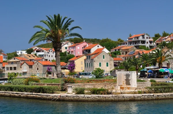 Buildings and palm tree in Vrboska. Croatia — Stock Photo, Image