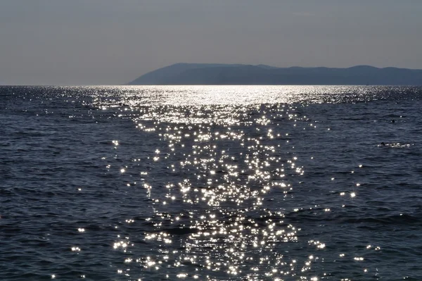 Reflexe na pobřeží Jaderského moře v podgora, Chorvatsko — Stock fotografie