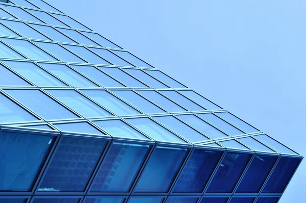 Abstract view of modern blue glass business center — Stock Photo, Image
