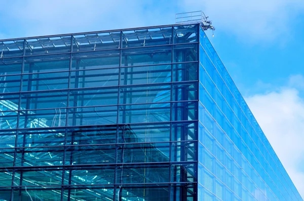 Abstract view of modern blue glass business center — Stock Photo, Image