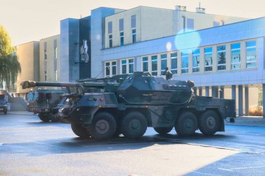 Polish military vehicle in a parking lot at an event in downtown Boleslawiec, Poland on a fall morning.