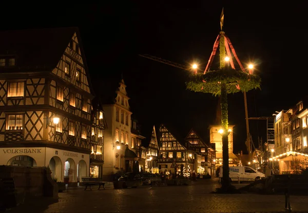 Gengenbach, Germany - December 13, 2020: Street in Gengenbach with half-timbered buildings and Christmas decorations during lockdown on a fall evening.