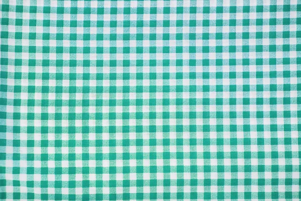 arka plan olarak yeşil kareli kumaş