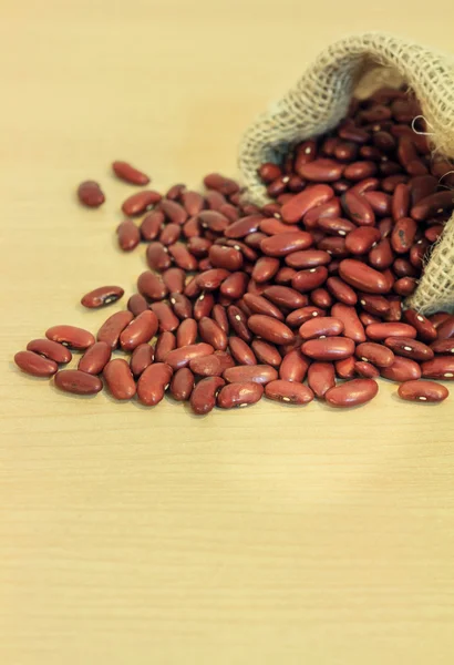 Red beans in bag Stock Photo by ©jianghongyan 58771125