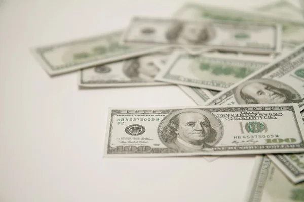 Dollar på en vit bakgrund. — Stockfoto