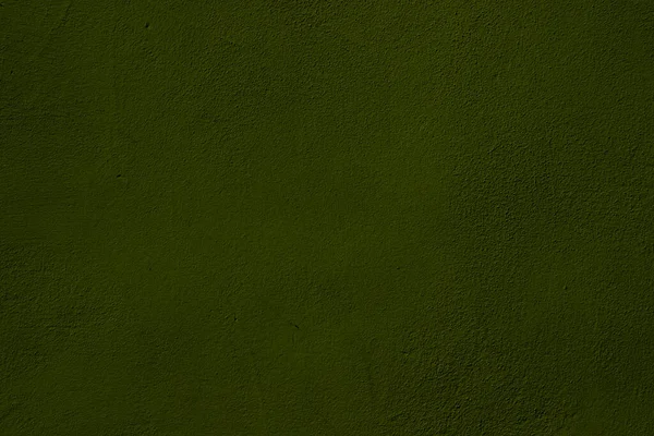 Olive green colored wall background with textures of different shades of green