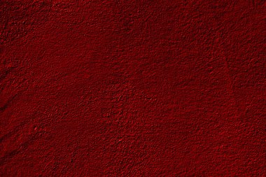 Kırmızı duvar arkaplanı, kırmızı rengin farklı tonlarında.