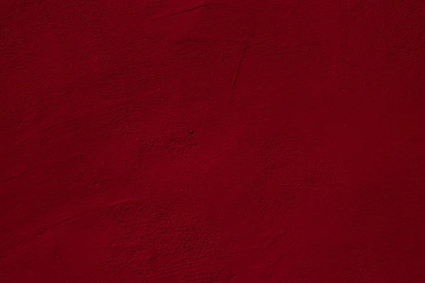 紅色の異なる色合いのテクスチャとクリムゾン色の壁の背景 — ストック写真