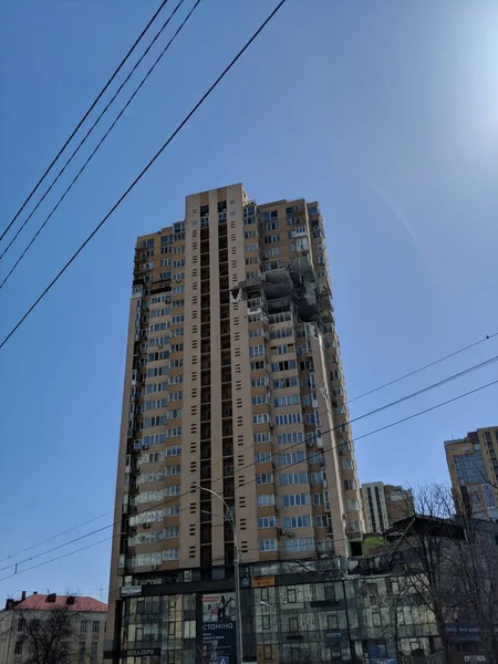 KYIV, UKRAINE - APRIL 15, 2022: Close-up of skyscraper was hit by russian rocket cruise guided missile — 스톡 사진