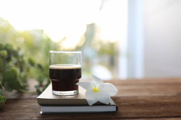 Black Coffee Cup Plumeria Flower Notebook Wooden Table — Fotografia de Stock
