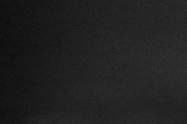 Crumpled black paper background texture