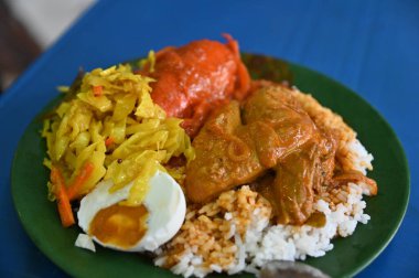 Georgetown, Penang Malezya - 13 Mayıs 2022: Georgetown Penang Klanı Jetties, Malezya. Penang Çin topluluğunun farklı klanları tarafından deniz kıyısında tahta kalelere inşa edilmiş ahşap köyler..