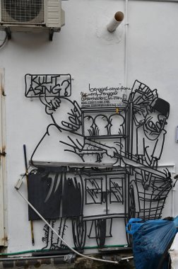 Georgetown, Penang Malezya - 13 Mayıs 2022: Georgetown Penang Klanı Jetties, Malezya. Penang Çin topluluğunun farklı klanları tarafından deniz kıyısında tahta kalelere inşa edilmiş ahşap köyler..