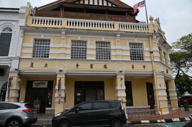 Georgetown, Penang Malezya - 13 Mayıs 2022: Georgetown Penang Klanı Jetties, Malezya. Penang Çin topluluğunun farklı klanları tarafından deniz kıyısında tahta kalelere inşa edilmiş ahşap köyler..