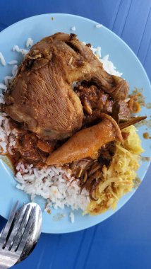 Georgetown, Penang Malezya - 13 Mayıs 2022: Georgetown Penang Klanı Jetties, Malezya. Penang Çin topluluğunun farklı klanları tarafından deniz kıyısında tahta kalelere inşa edilmiş ahşap köyler..