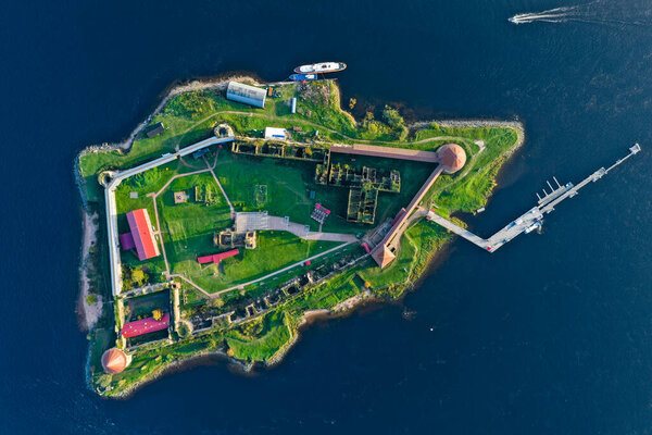 Aerial photography of the Oreshek Fortress in Shlisselburg in summer in Lake Ladoga. Top view of Walnut Island with a fortress. Russia, Shlisselburg, 08.21.2021