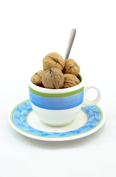 Cup of walnuts — Stock Photo, Image