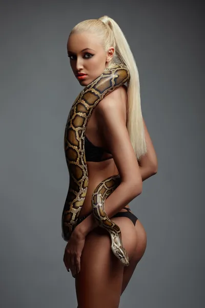 Girl with python — Stock Photo, Image