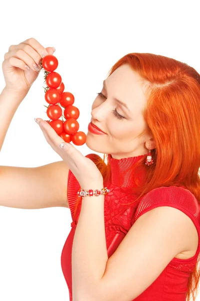 Woman with cherry tomatoes — Stock Photo, Image