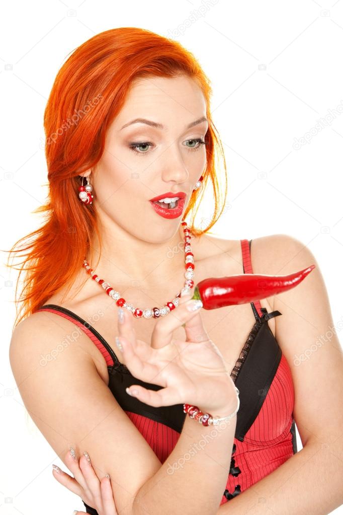 redhead woman with chili pepper