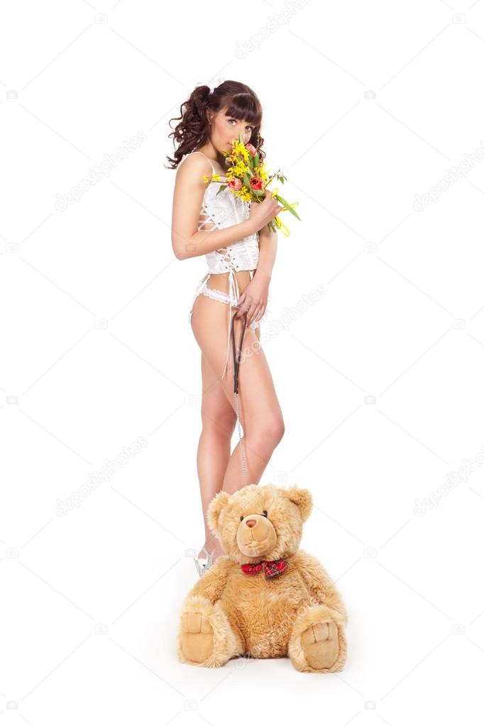 Young woman with teddy bear