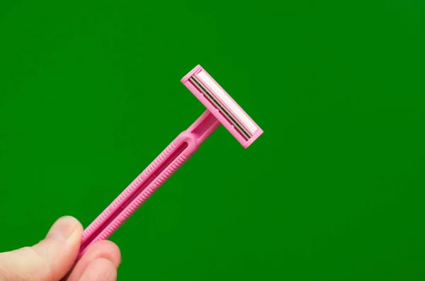 Pink Disposable Razor Male Hand Green Background — Stock Photo, Image