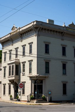 Athens, NY - USA - Aug 4, 2022 Vertical view of entrance to the Steward House, a historic boutique hotel on Athens riverfront.