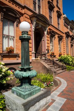 Saratoga Springs, NY - USA - Aug 3, 2022  A vertical closeup of the historic Canfield Casino, located inside Congress Park. Listed on the National Register of Historic Places,