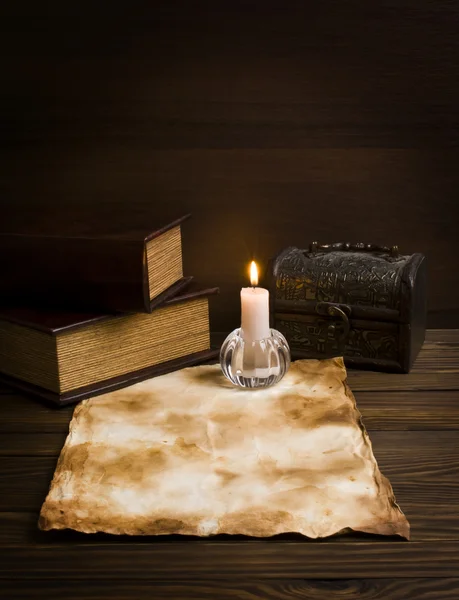Old papers and books on a wooden table — Stock Photo, Image