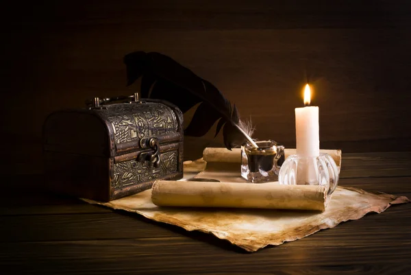 Old papers and books on a wooden table — Stock Photo, Image