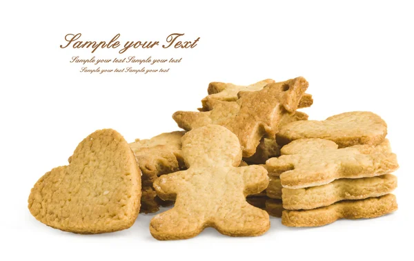 Pan de jengibre hombre y galletas. Aislado sobre fondo blanco — Foto de Stock