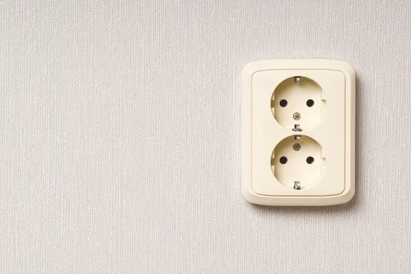 White electric socket on the wall. Close up. — Stock Photo, Image