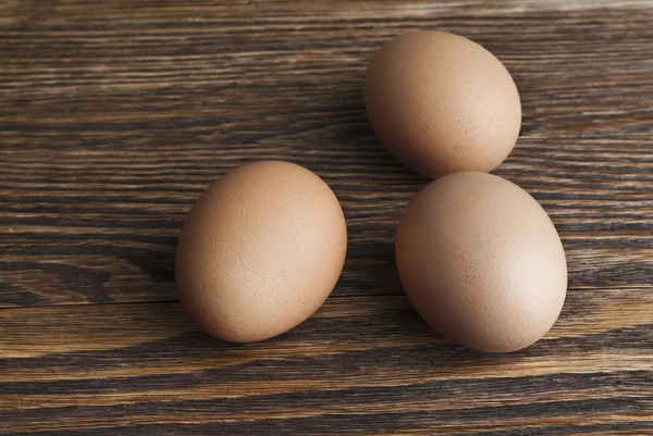 Chicken eggs on kitchen table — Stock Photo, Image