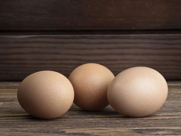 Chicken eggs on kitchen table — Stock Photo, Image