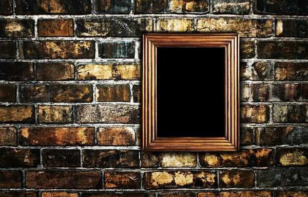 Old frame against wall — Stock Photo, Image