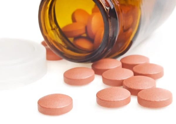 Pillen und Tabletten auf weißem Hintergrund — Stockfoto