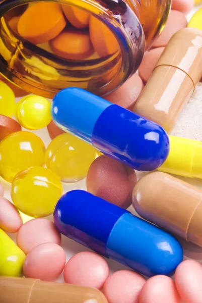 Colorful tablets with capsules — Stock Photo, Image