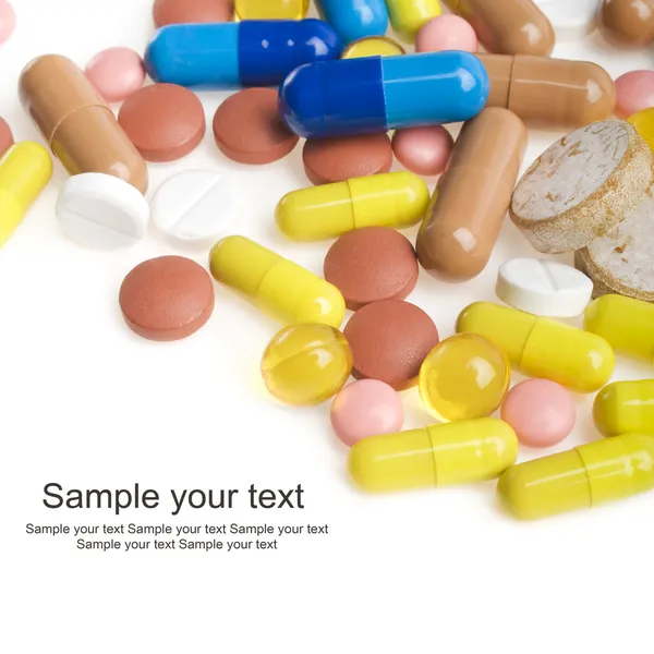 Colorful tablets with capsules — Stock Photo, Image