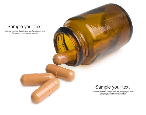 Pillen een pil fles op witte achtergrond — Stockfoto