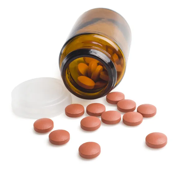 Pillen und Tabletten auf weißem Hintergrund — Stockfoto