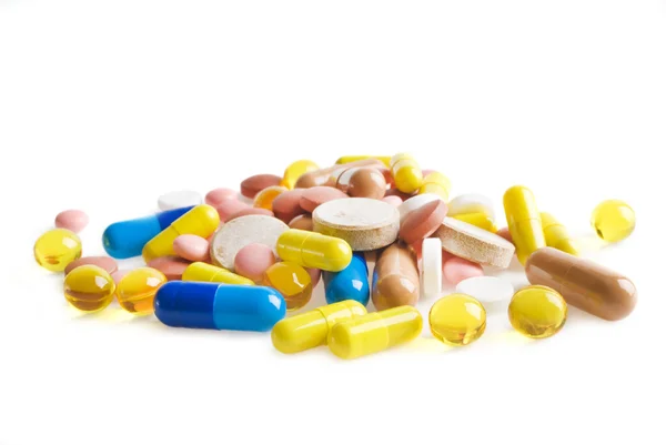 Kleurrijke tabletten met capsules — Stockfoto