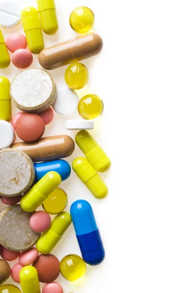 Colorful tablets with capsules — Stock Photo, Image