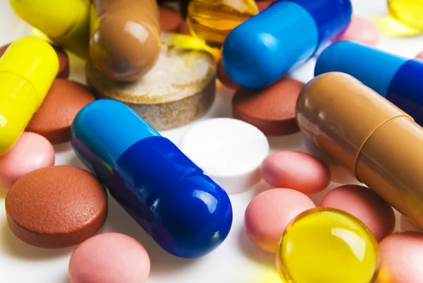 Colorful tablets with capsules — Stock Photo, Image