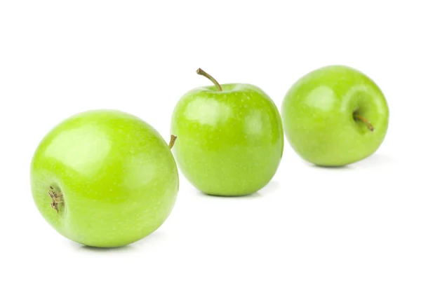 Green apples on a white background — Stock Photo, Image