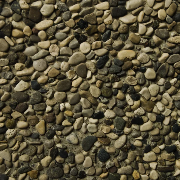 Hintergrund ist die Textur verschiedener Kieselsteine — Stockfoto