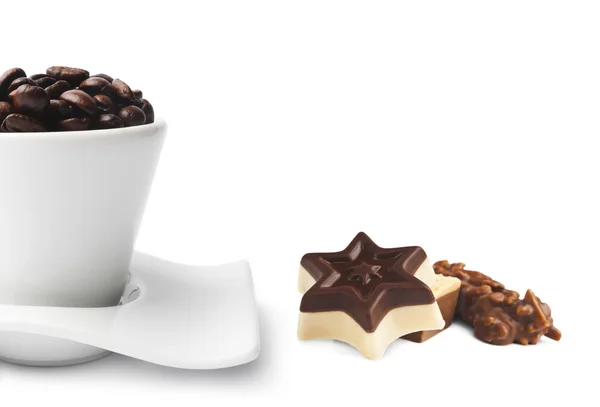 Cup of Coffee and chocolate bonbons — Stock Photo, Image
