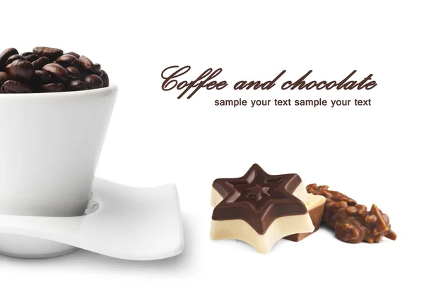 Cup of Coffee and chocolate bonbons — Stock Photo, Image