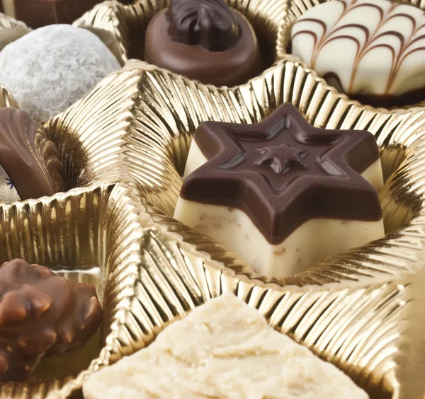 Mleczne czekoladki cukierki w pudełku — Zdjęcie stockowe