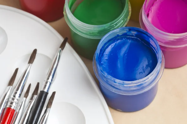 Paint buckets and brush — Stock Photo, Image