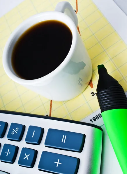 Tazza di caffè e diagramma — Foto Stock